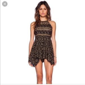 Free People black and gold romper